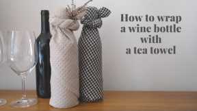 How to wrap a wine bottle with a tea towel - reusable and eco-friendly gift wrapping idea!