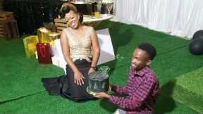 Mwizukanji gifts Logic with a cake on her 30th Birthday