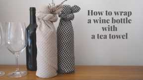 How to wrap a wine bottle with a tea towel (kitchen towel/dish towel) - reusable gift wrapping idea!