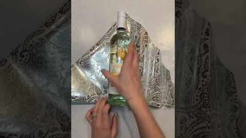 Best way to wrap a wine bottle #wrappingpresents #giftwrapping #wine