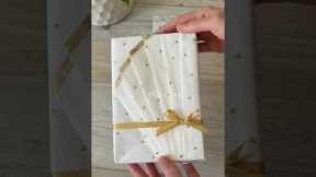 Learn how to pleat-wrap a gift! Simple and elegant style #how #gift #giftwrapping #wrapping #pleated